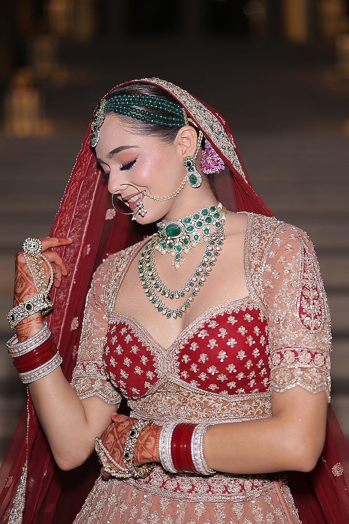 Light Peach Net Dabka & Cutdana Embroidered Bridal Lehenga Set by Tanaksh at Pernia's Pop Up Shop