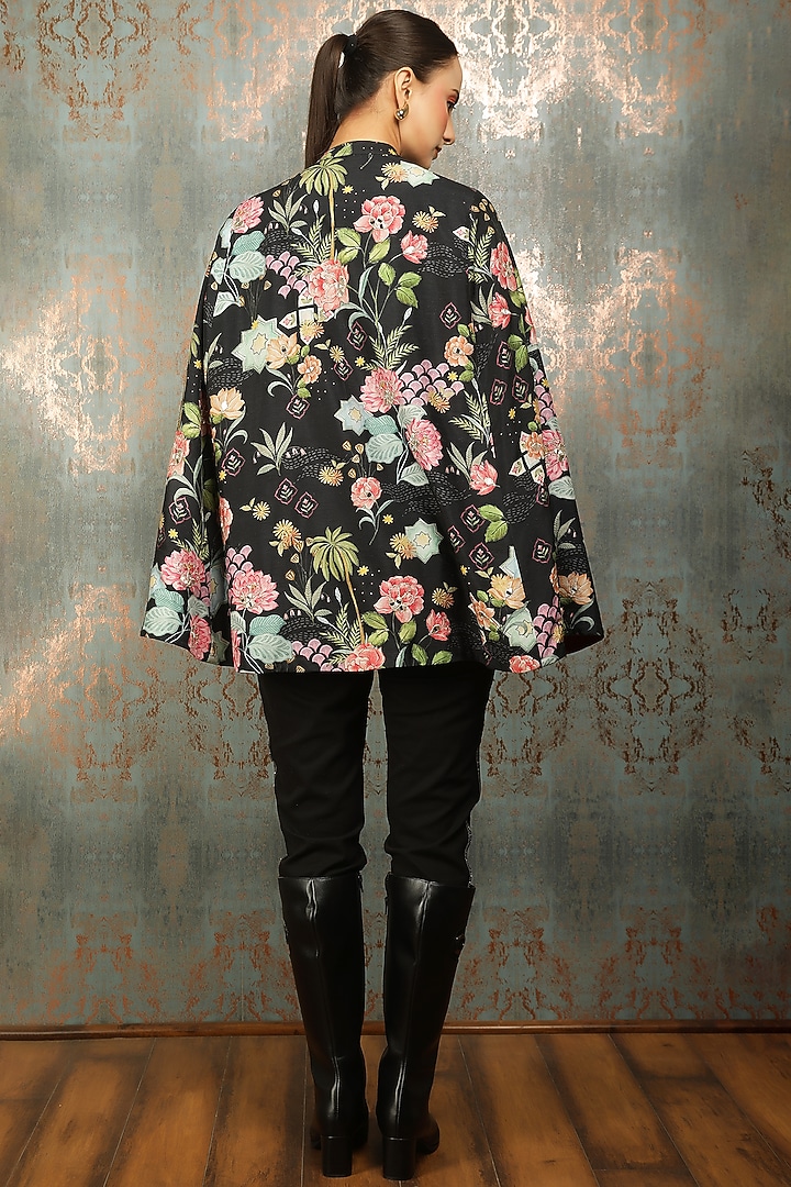 Black Raw Silk Printed & Mirror Work Cape by Tanu Malhotra at Pernia's Pop Up Shop