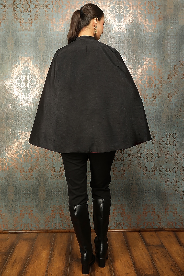 Black Raw Silk Floral Embroidered Cape by Tanu Malhotra at Pernia's Pop Up Shop