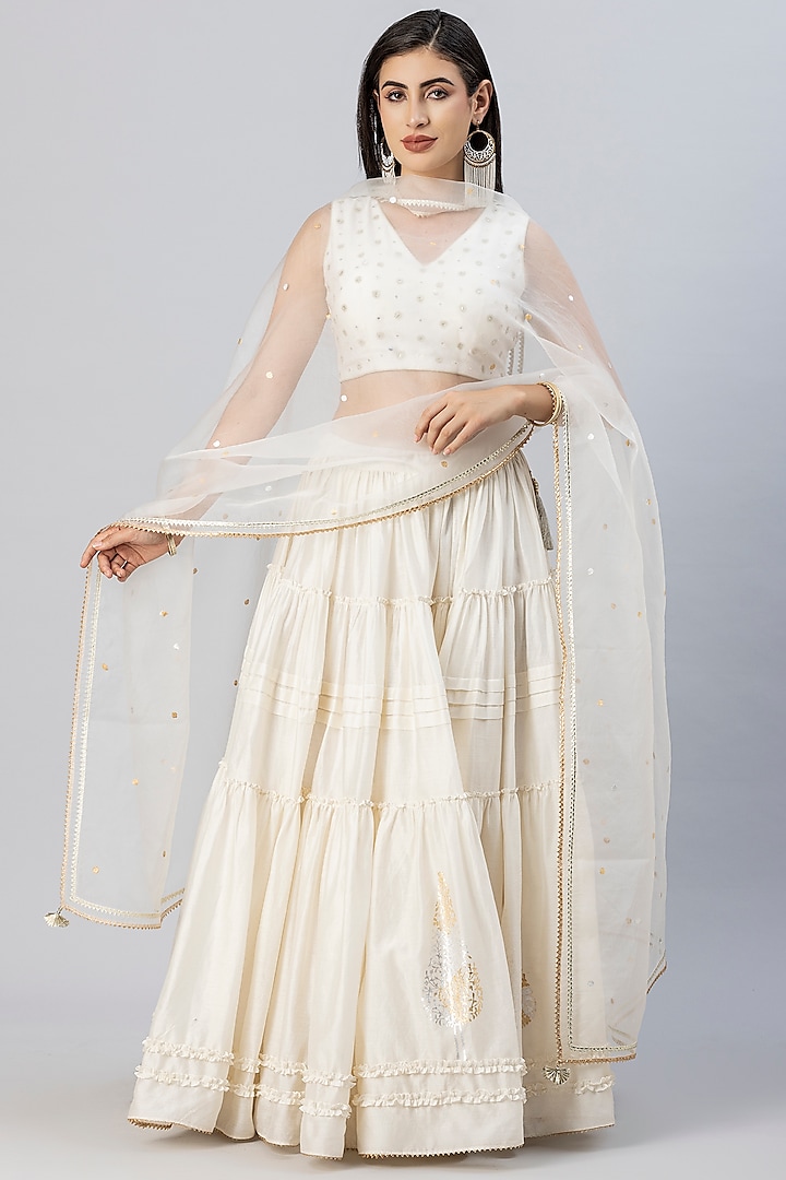 Ivory Chanderi Silk Tiered Lehenga Set by Tanu Malhotra at Pernia's Pop Up Shop