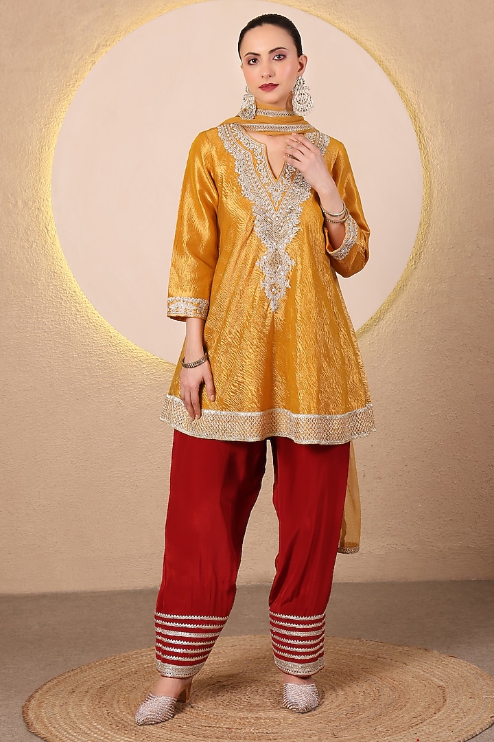 Mustard Yellow Crushed Tissue Embroidered Flared kurta Set by Tanu Malhotra at Pernia's Pop Up Shop
