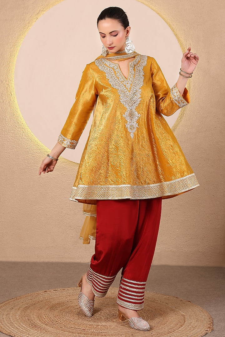 Mustard Yellow Crushed Tissue Embroidered Flared kurta Set by Tanu Malhotra at Pernia's Pop Up Shop