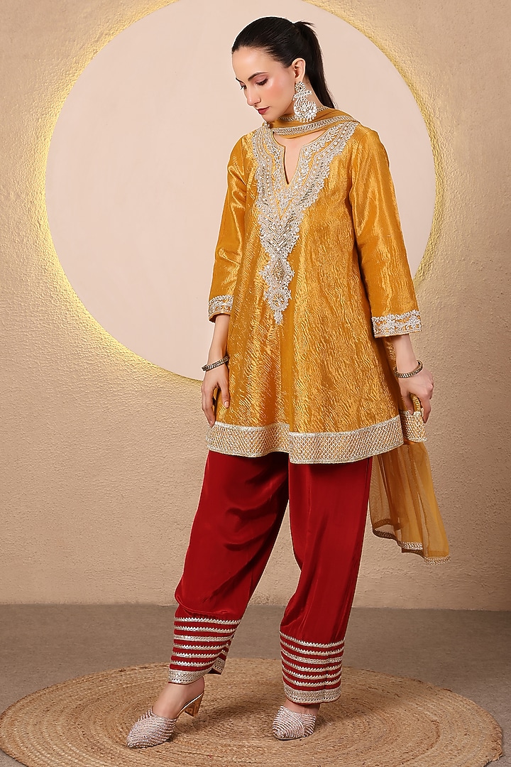 Mustard Yellow Crushed Tissue Embroidered Flared kurta Set by Tanu Malhotra at Pernia's Pop Up Shop