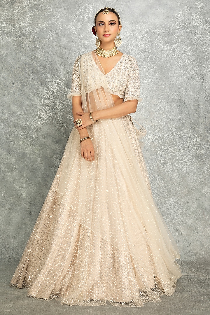 Ivory Net Embroidered Flowy Wedding Lehenga Set by Tanu Malhotra at Pernia's Pop Up Shop