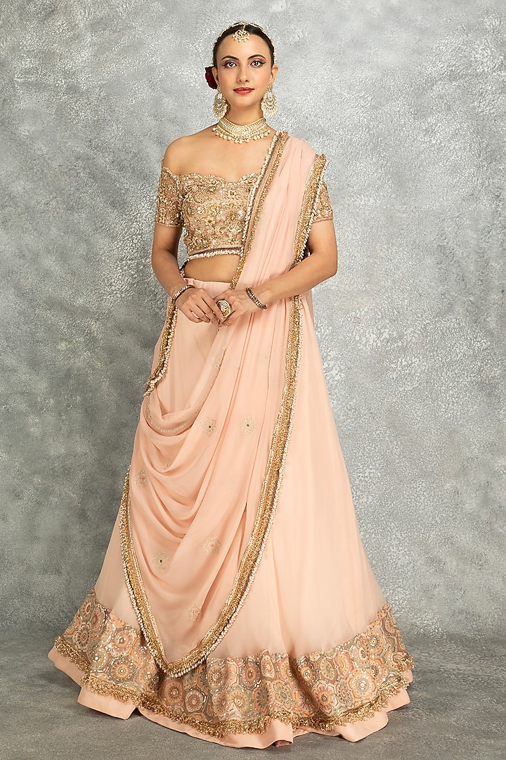 Peach Georgette Sequins Embroidered Wedding Lehenga Set by Tanu Malhotra at Pernia's Pop Up Shop