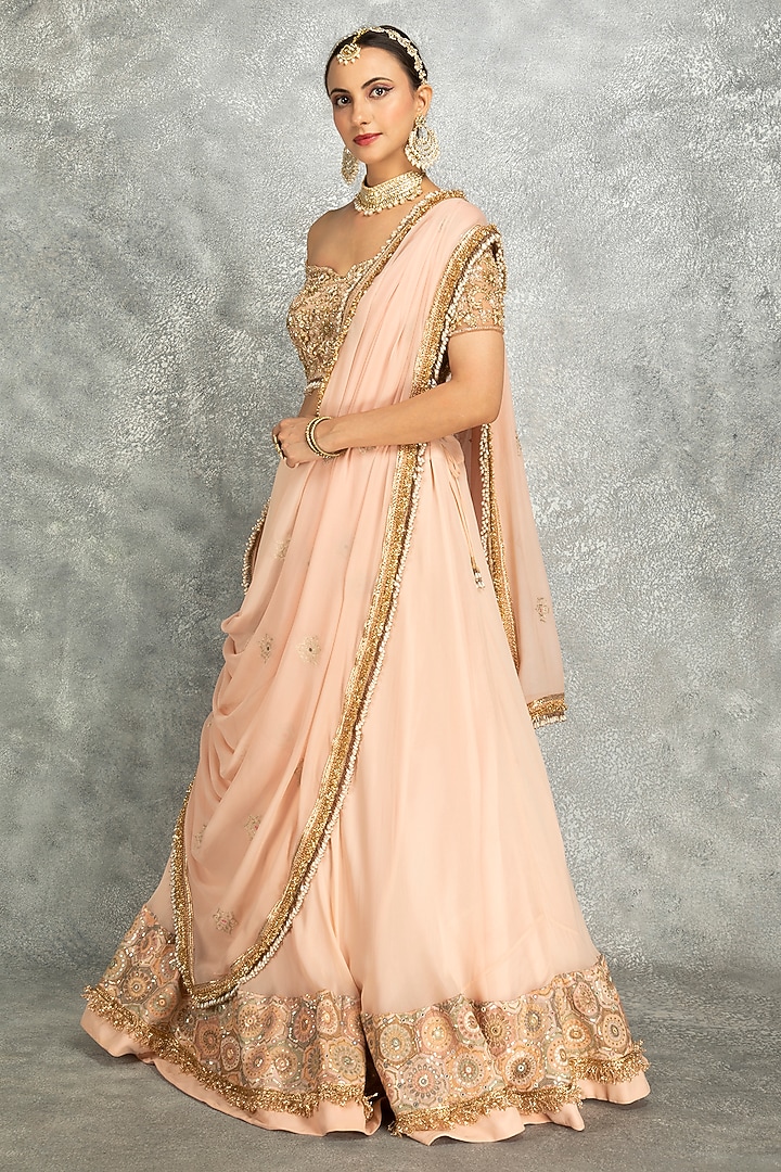 Peach Georgette Sequins Embroidered Wedding Lehenga Set by Tanu Malhotra at Pernia's Pop Up Shop