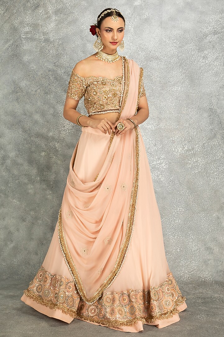 Peach Georgette Sequins Embroidered Wedding Lehenga Set by Tanu Malhotra at Pernia's Pop Up Shop