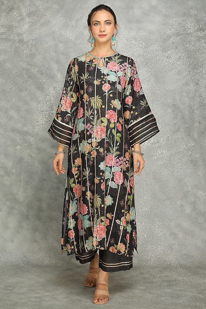 Black Cotton Silk Floral Digital Printed & Gota Work Kurta Set
by Tanu Malhotra at Pernia's Pop Up Shop