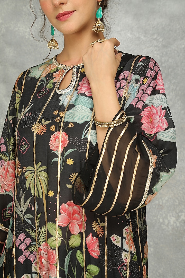 Black Cotton Silk Floral Digital Printed & Gota Work Kurta Set
by Tanu Malhotra at Pernia's Pop Up Shop