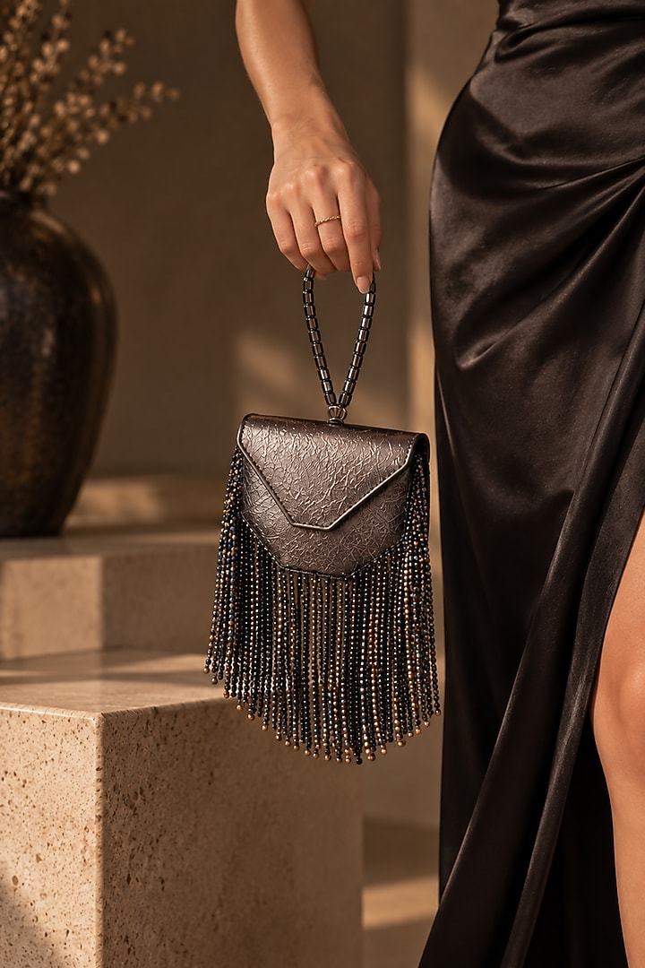 Gunmetal Grey Vegan Leather Fringe Embellished Clutch by TAN Studio at Pernia's Pop Up Shop