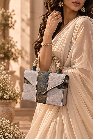 Denim Blue Jute Braided Clutch by TAN Studio