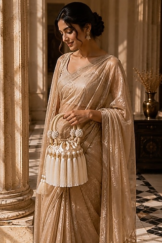 Ivory Satin Fringe Embellished Potli by TAN Studio