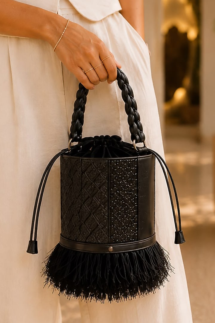 Black Vegan Leather Textured Bucket Bag by TAN Studio at Pernia's Pop Up Shop
