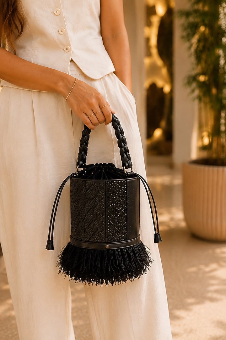 Black Vegan Leather Textured Bucket Bag by TAN Studio at Pernia's Pop Up Shop
