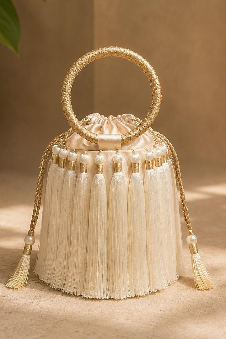 Ivory Satin Embellished Handcrafted Potli by TAN Studio at Pernia's Pop Up Shop