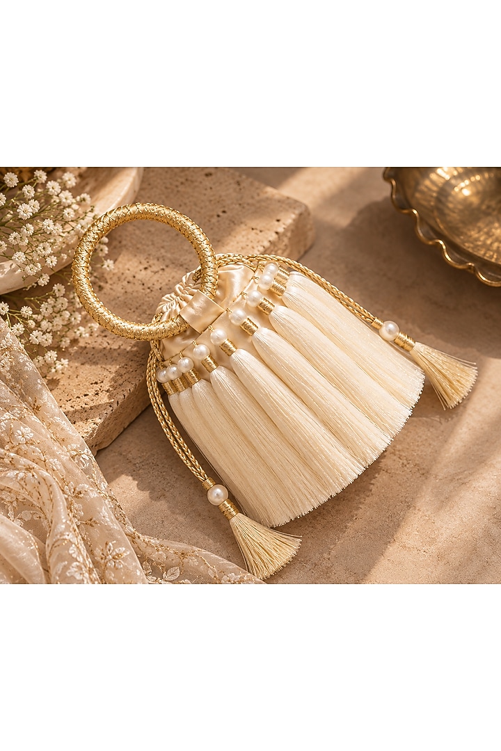Ivory Satin Embellished Handcrafted Potli by TAN Studio at Pernia's Pop Up Shop