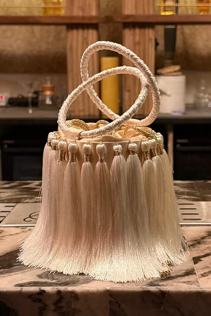 Ivory Satin Embellished Handcrafted Potli by TAN Studio at Pernia's Pop Up Shop