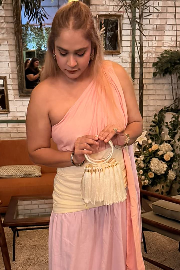 Ivory Satin Embellished Handcrafted Potli by TAN Studio at Pernia's Pop Up Shop