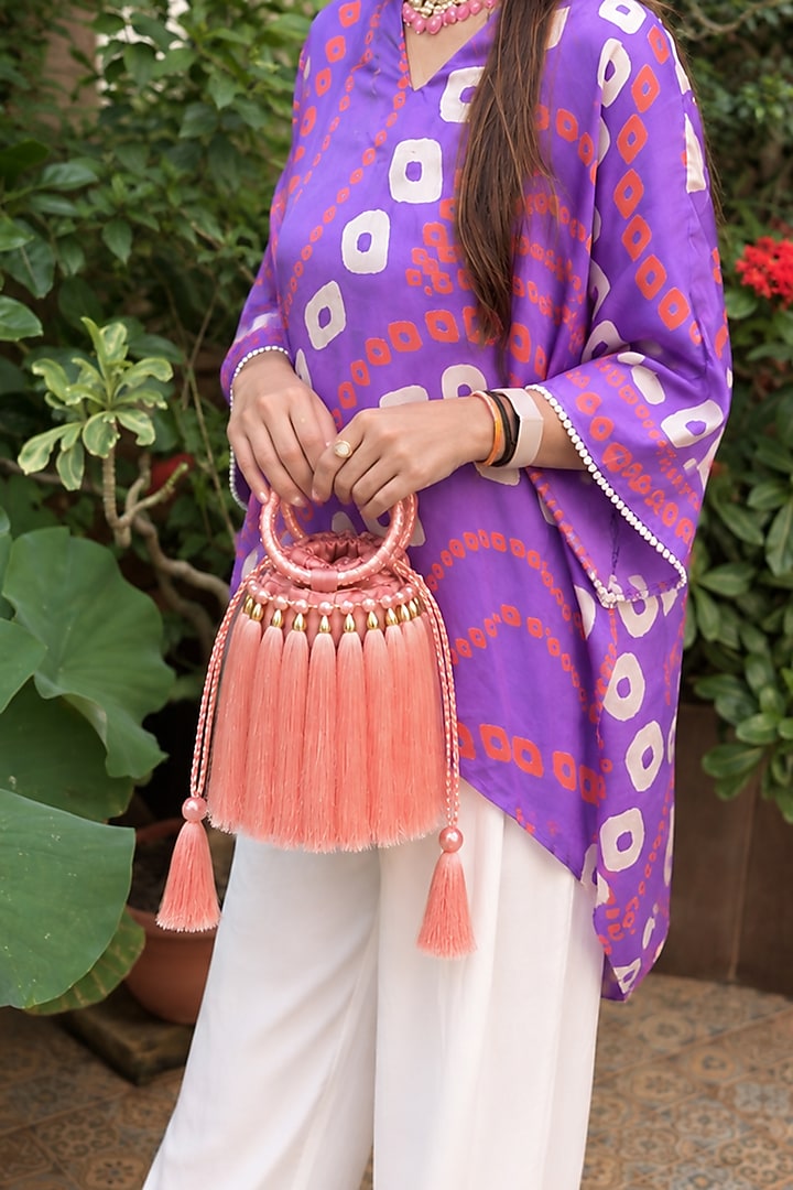 Peach Satin Embellished Textured Potli by TAN Studio at Pernia's Pop Up Shop
