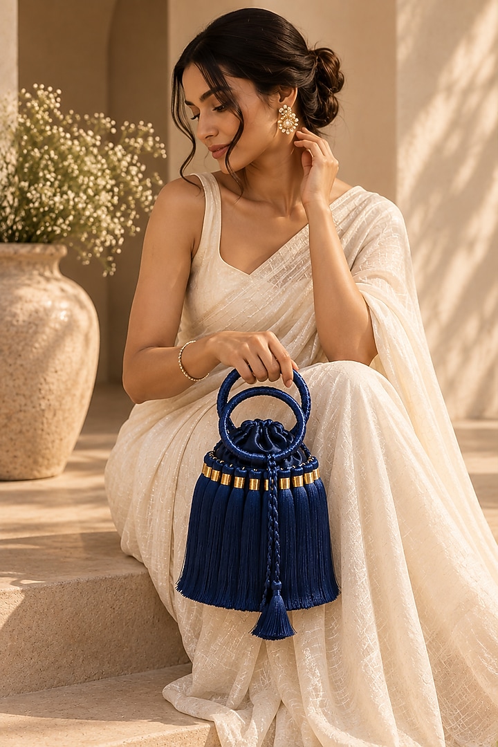 Blue Satin Embellished Potli by TAN Studio at Pernia's Pop Up Shop