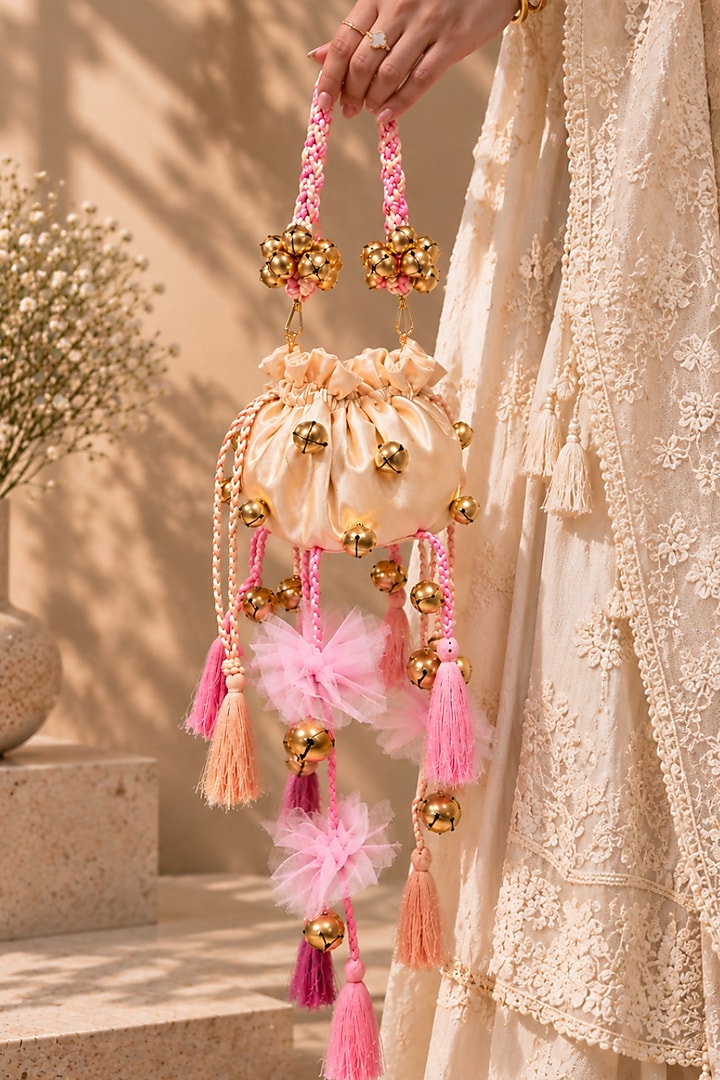 Ivory Satin Floral Embellished Handcrafted Potli by TAN Studio at Pernia's Pop Up Shop