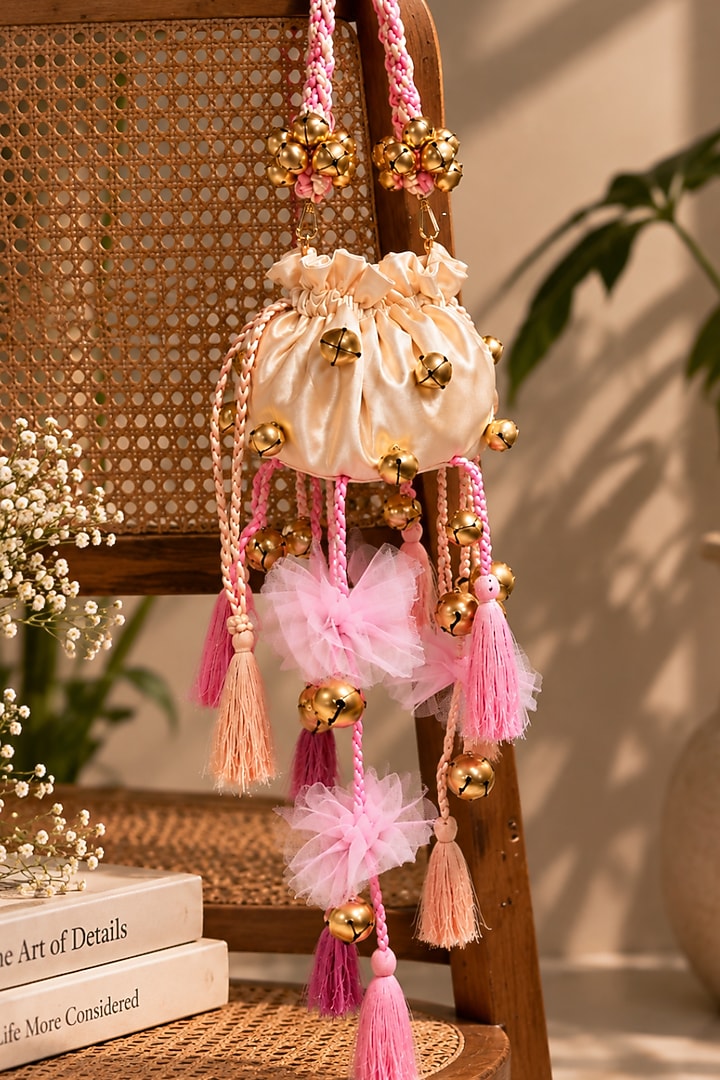 Ivory Satin Floral Embellished Handcrafted Potli by TAN Studio at Pernia's Pop Up Shop