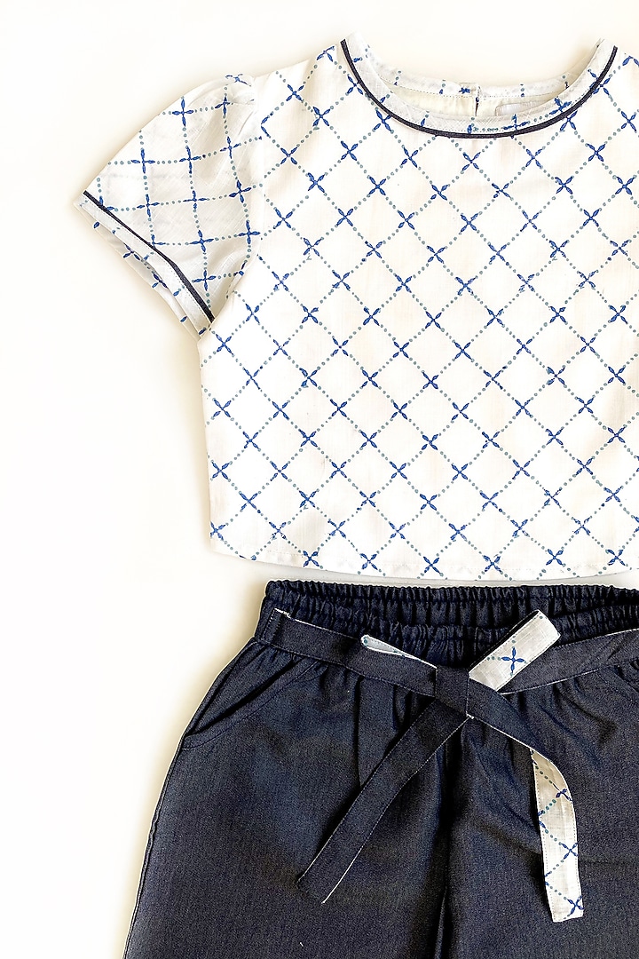 White Printed Top With Blue Pants For Girls by Taramira at Pernia's Pop Up Shop