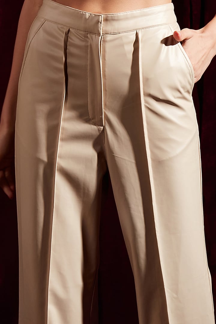 Cream Faux Leather Straight-Fit Trousers by Tara and I at Pernia's Pop Up Shop