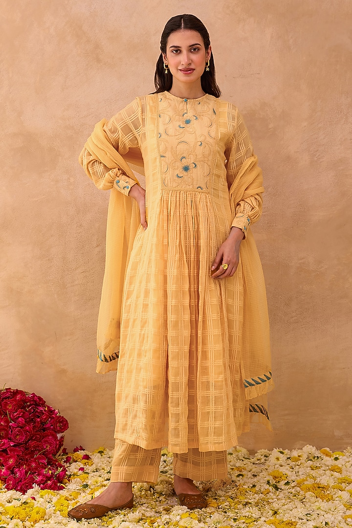 Marigold Yellow Self-Textured Cotton Floral Embroidered Kurta Set by TARO at Pernia's Pop Up Shop