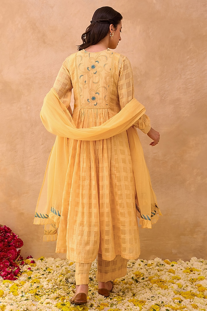 Marigold Yellow Self-Textured Cotton Floral Embroidered Kurta Set by TARO at Pernia's Pop Up Shop