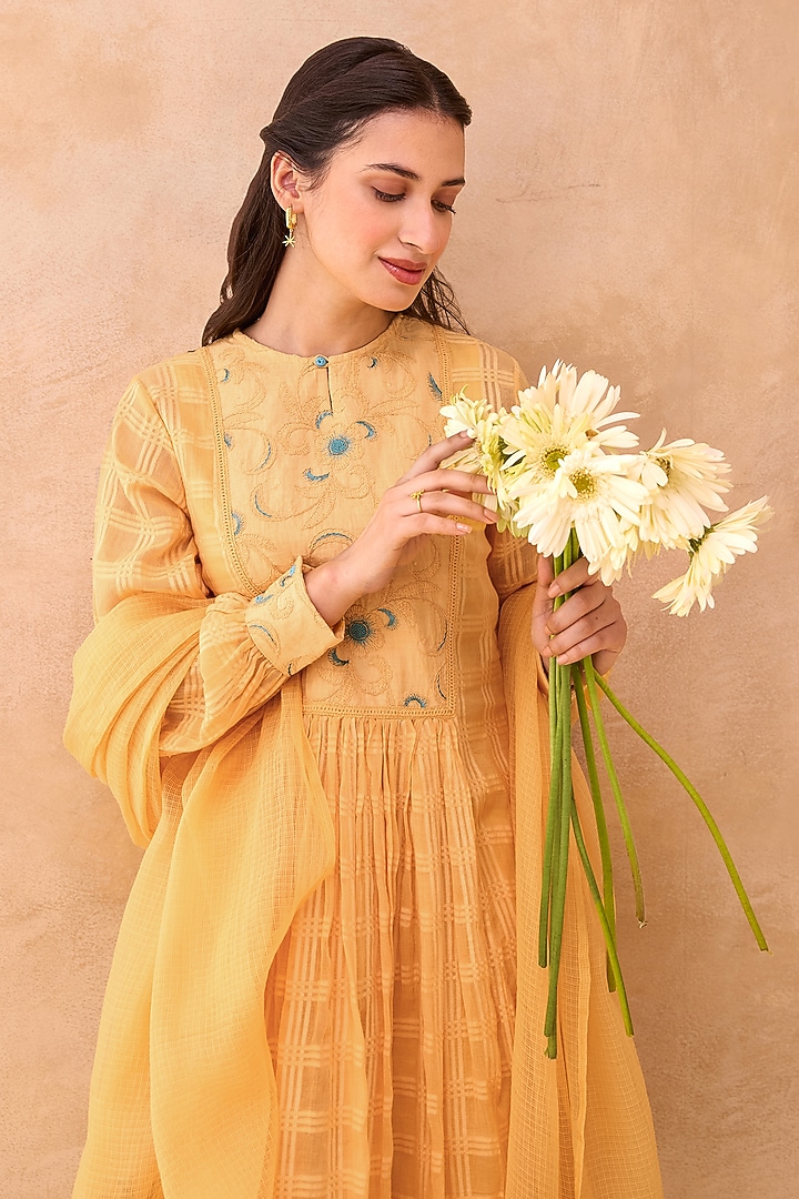 Marigold Yellow Self-Textured Cotton Floral Embroidered Kurta Set by TARO at Pernia's Pop Up Shop