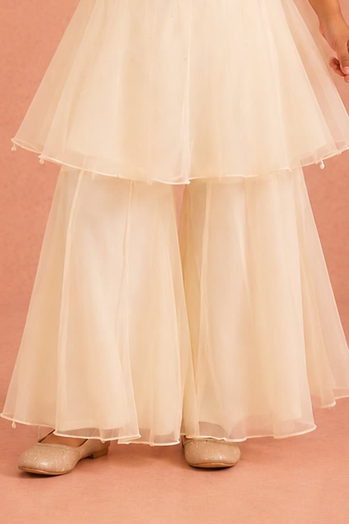 Ivory Organza Floral Embroidered Sharara Set For Girls by Tarini Vij Kids at Pernia's Pop Up Shop