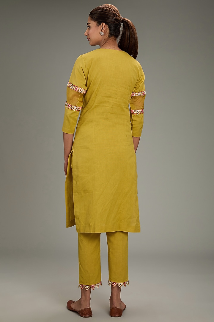 Yellow Cotton Linen Hand & Machine Embroidered Kurta Set by TARINI VIJ at Pernia's Pop Up Shop