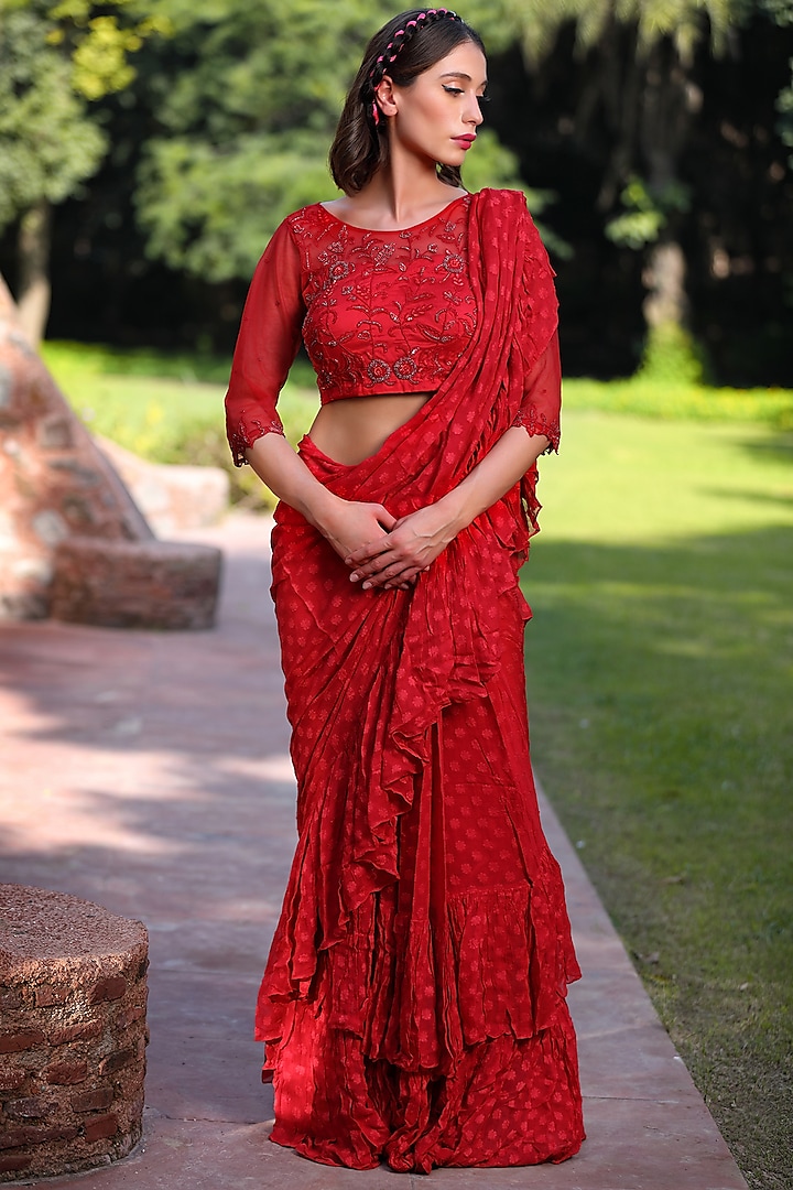 Red Textured Chiffon Ruffled Saree Set by TARINI VIJ