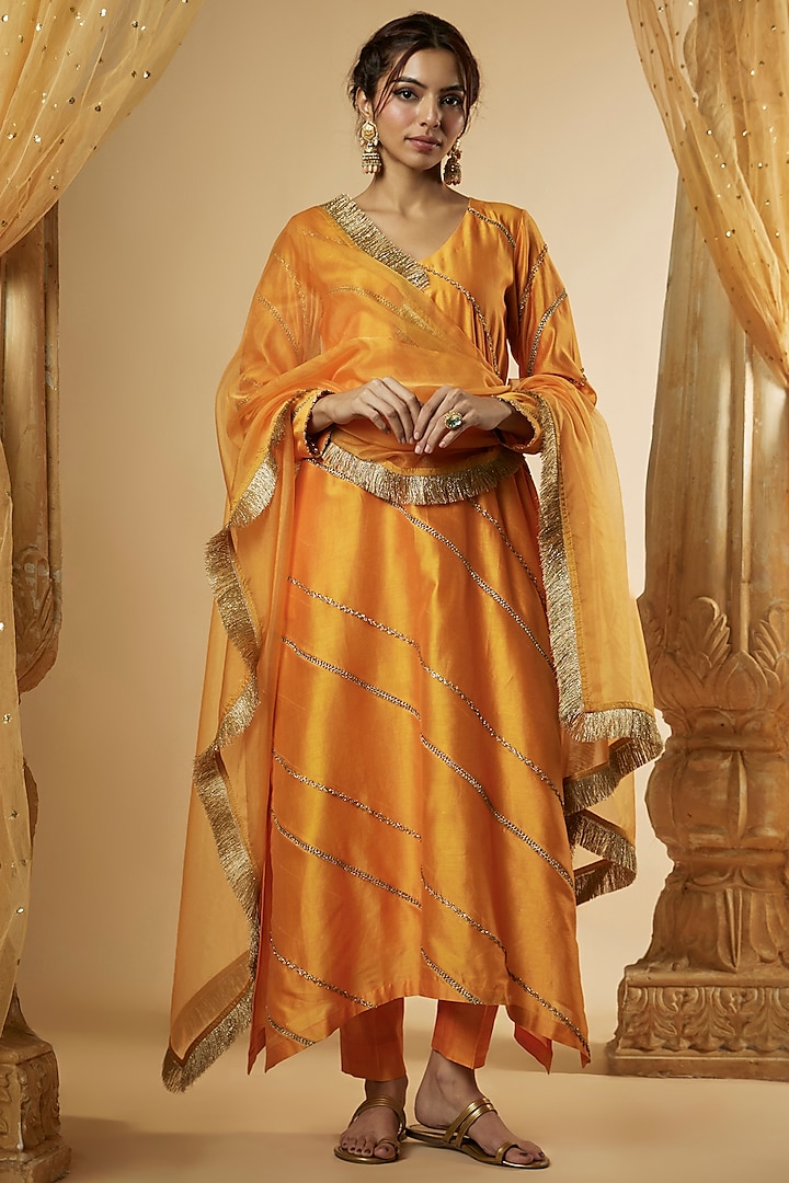 Light Orange Chanderi Silk & Zari Organza Paneled Kurta Set by The Aarya