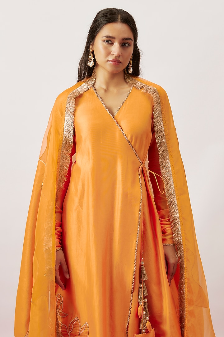 Golden poppy silk chanderi short angrakha kurta set with embroidered neckline.