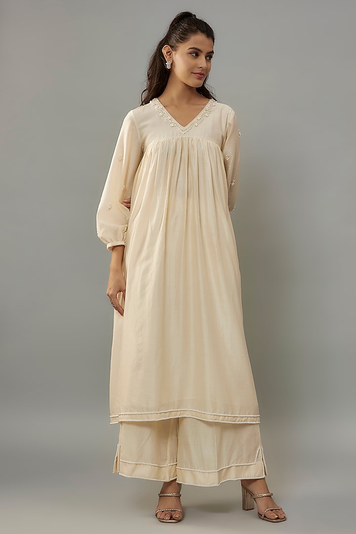 Ivory Handwoven Chanderi Pearl Embroidered Kurta Set by The Aarya at Pernia's Pop Up Shop