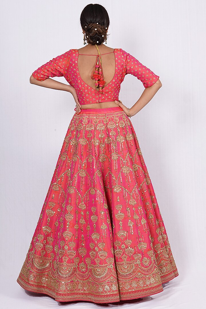 Rusty Orange Hand Embroidered Wedding Lehenga Set by Tassels at Pernia's Pop Up Shop