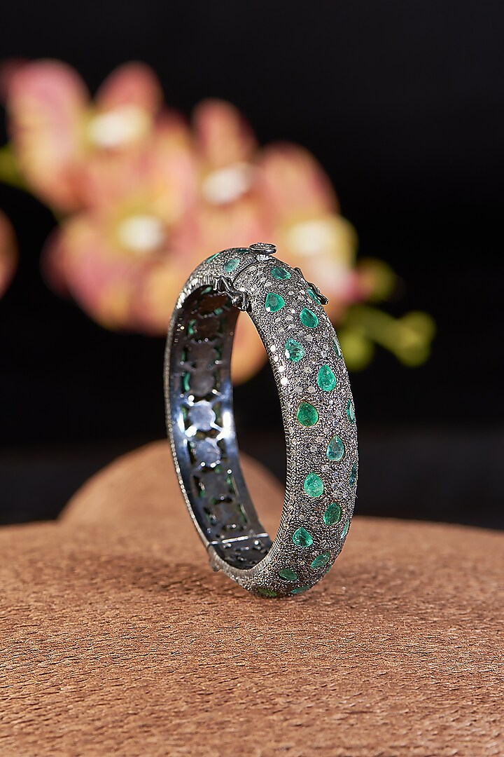 Two Tone Finish Single Cut Diamond & Emerald Bangle In Sterling Silver by The Alchemy Studio at Pernia's Pop Up Shop