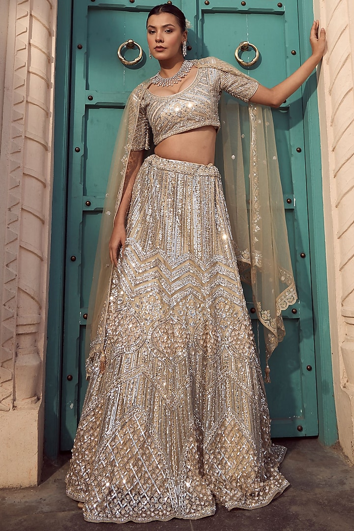 Ivory & Gold Net Embroidered Wedding Lehenga Set by Tasuvure at Pernia's Pop Up Shop