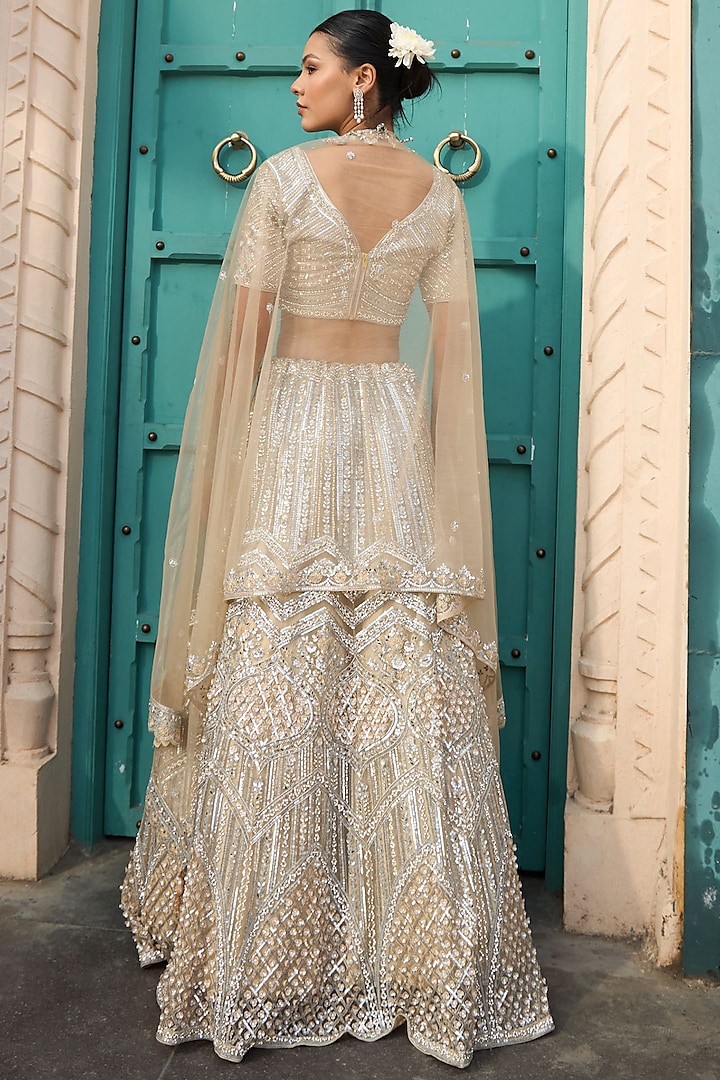 Ivory & Gold Net Embroidered Wedding Lehenga Set by Tasuvure at Pernia's Pop Up Shop