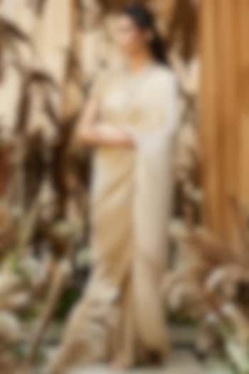 Nude Satin Pleated Gown Saree by Tasuvure Indes