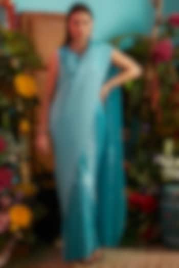 Turquoise Pleated Gown Saree by Tasuvure Indes
