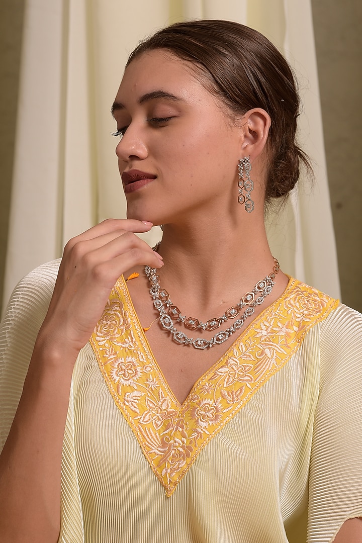 Yellow Pleated Silk & Georgette Embroidered Cape Set by Tasuvure at Pernia's Pop Up Shop