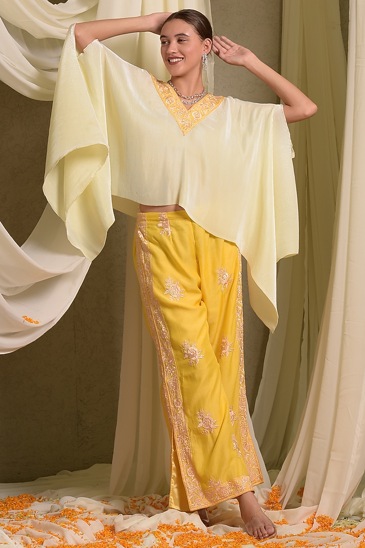 Yellow Pleated Silk & Georgette Embroidered Cape Set by Tasuvure at Pernia's Pop Up Shop