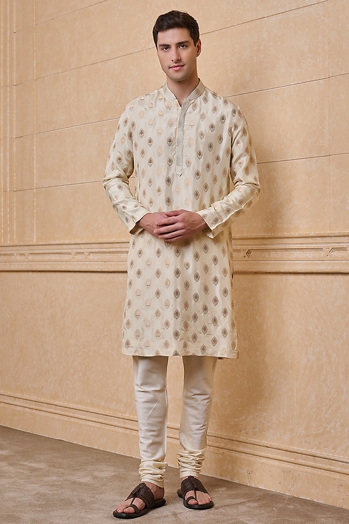 Gold Jacquard Zari Textured Kurta Set by TASVA