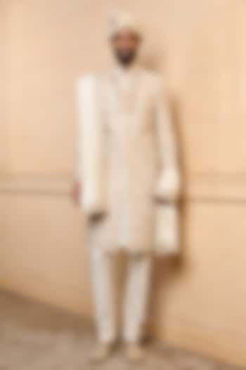 Ivory Raw Silk Embroidered Groom Sherwani Set by TASVA at Pernia's Pop Up Shop