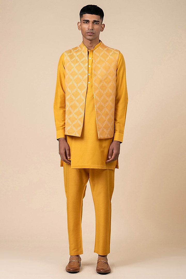 Yellow Cotton Textured Bundi Jacket Set by TASVA