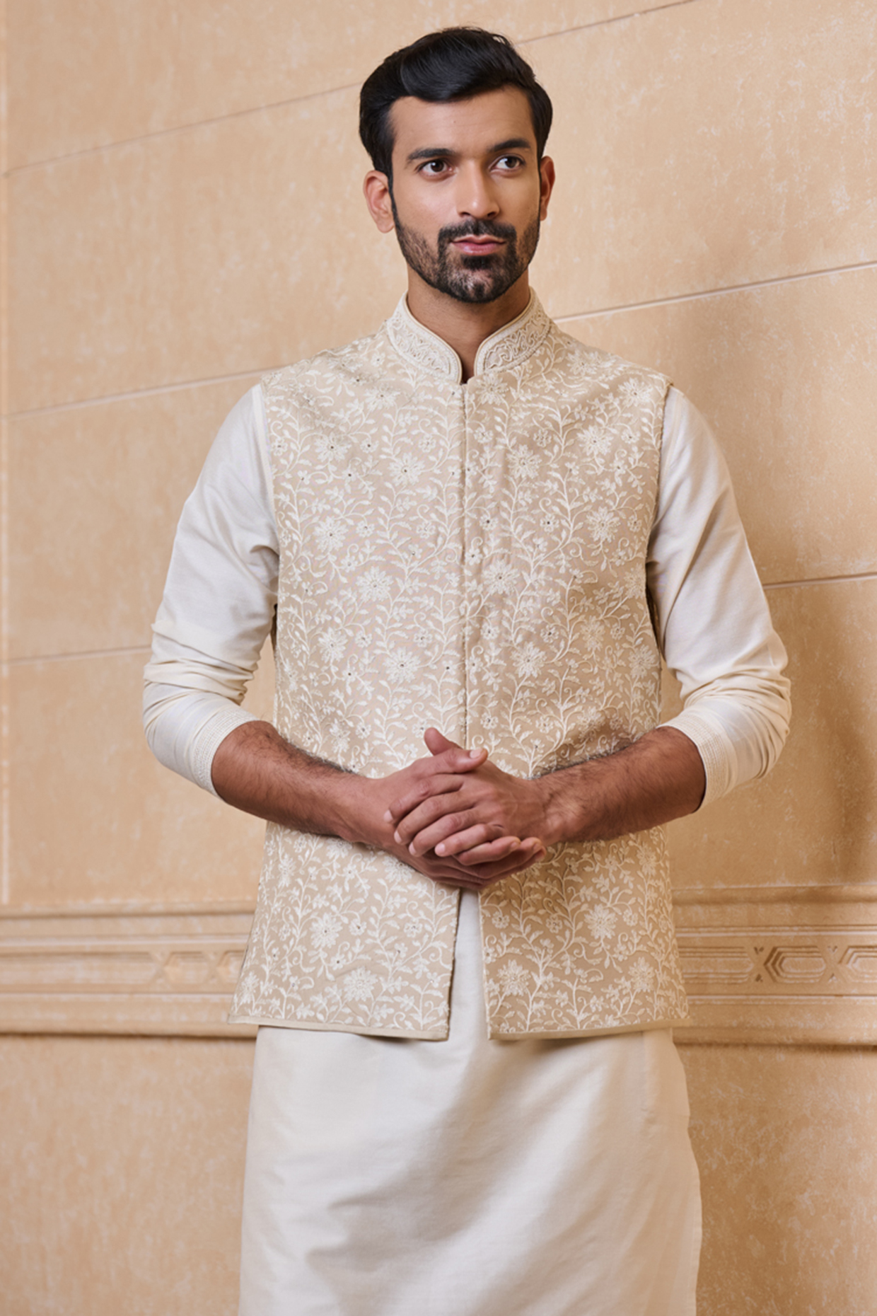 Gold Cotton Embroidered Bundi Jacket by TASVA