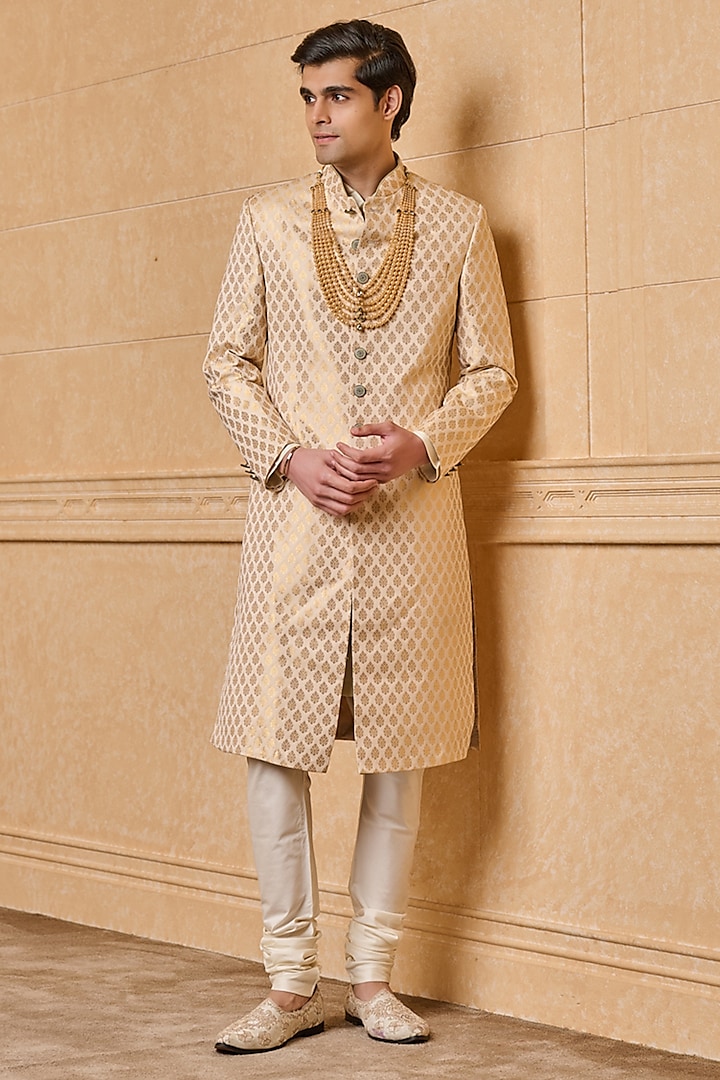 Ivory Gold Poly Zari Brocade Sherwani Set by TASVA